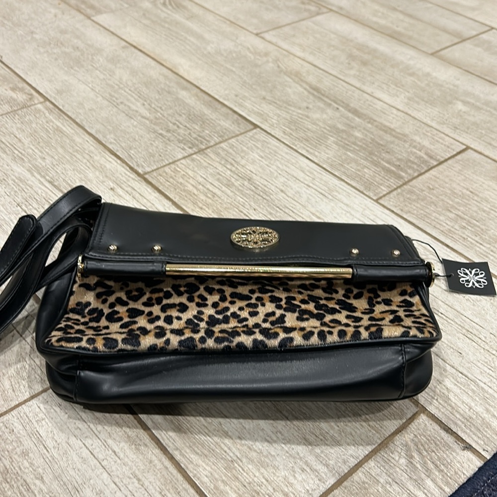 Avon Signature Collection “Raising the Bar” Black Handbag. Adjustable Strap. NWT